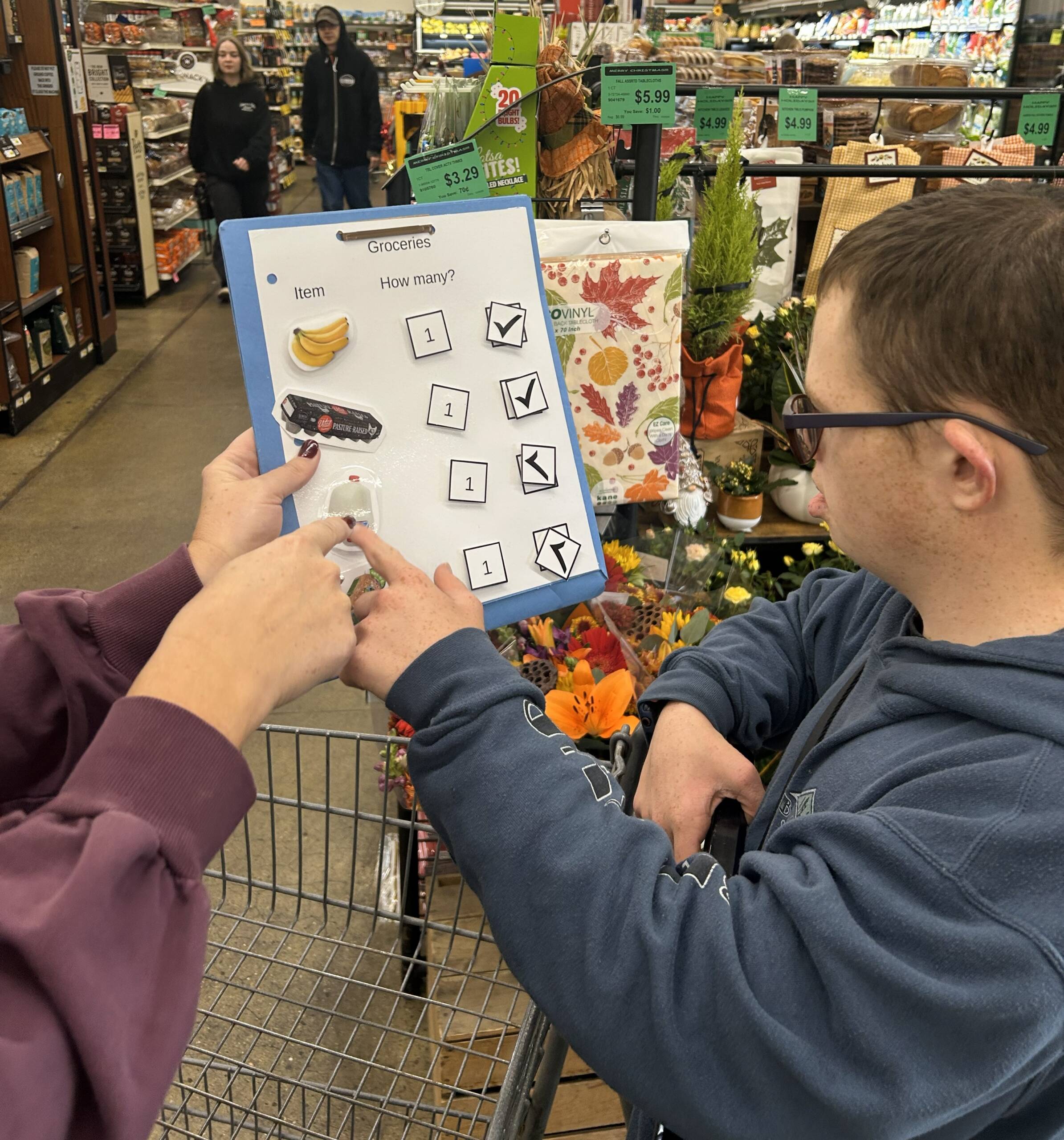 Student pointing to his chart.
