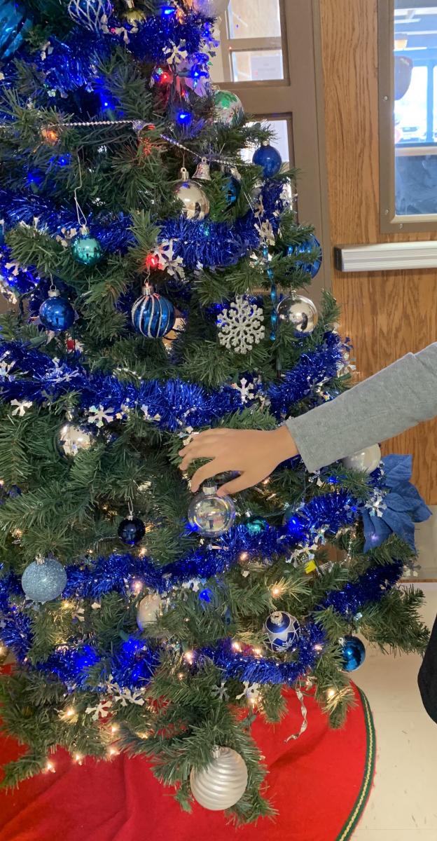 Campus Christmas tree with blue garlands and ornaments