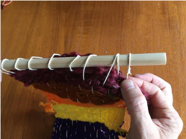 Putting the dowel through