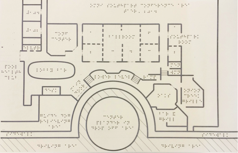  Tactile map on swell paper with floor plan that includes braille map title and room labels
